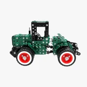 Zijaanzicht groene tractor met rode velgen