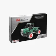 Verpakking groene tractor met rode velgen